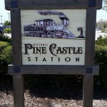 Painted sandblasted cedar sign.