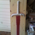 Finished fiberglass and bondo sword hilt for Skull Knight