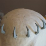 Clay sculpture of Skull Knight helmet top view