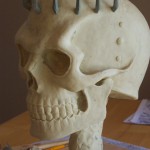 Clay sculpture of Skull Knight helmet left view