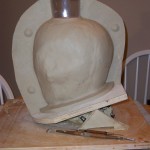 Finished clay stage for case mold on Skull Knight helmet