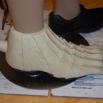 Finished clay sculpture of Skull Knight right boot armor