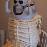 Finished clay sculpture of breastplate and back shoulder and vertebrae armor for Skull Knight including fiberglass spiked collar