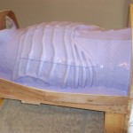 1st layer of silicone for front half of Skull Knight breast plate armor brush mold.