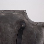 Skull Knight shield rear view, bondo edge with faux rivets, leather belt add on for strap handle