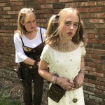 Steampunk mother and windup doll daughter