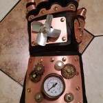 Finished glove with rub-n-buff colored gears add ons