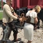 Steampunk father and windup doll daughter