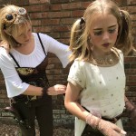 Steampunk mother and windup doll daughter