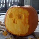 Phase 2 of 3D pumpkin carving, removing outer skin and beginning design