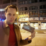 Justin outside the actual theatre where Last Actin Hero's Pandora set was filmed inside.