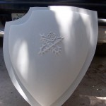 Skull Knight shield plug, foam, fiberglass, Bondo, and primer