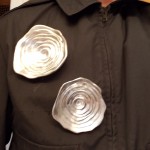Test fitting bullet holes on jacket using magnets