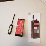 Random parts and vinyl print to create a police scanner radio for the T-1000