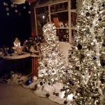 Winter wonderland scene at night with twinkling lights.