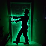 Final effect of a back lit zombie with green Christmas lights