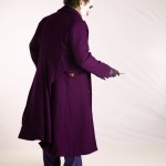 Joker Cosplay rear view knife pose; photo by TKirk photos
