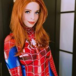 Meredith in a lovely shade of red as Mary Jane Watson.